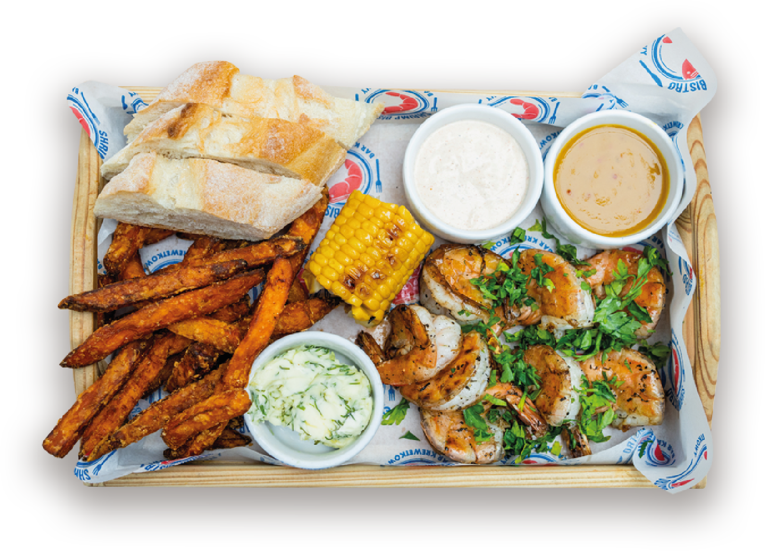 Krewetki grillowane: 5 lub 8 krewetek tygrysich w pancerzach 16/20, grillowane w zestawie z bagietką, masłem czosnkowym, kukurydzą, sosami: mango chili i czosnkowym